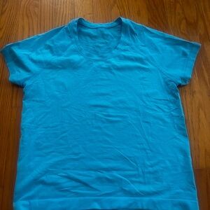 Lululemon swiftly race length- size 8 (electric turquoise)